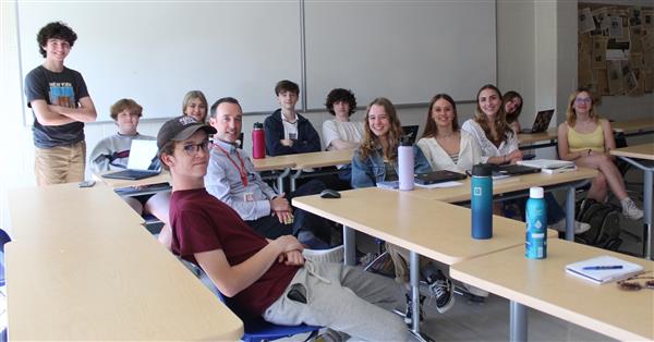  students smiling for camera 